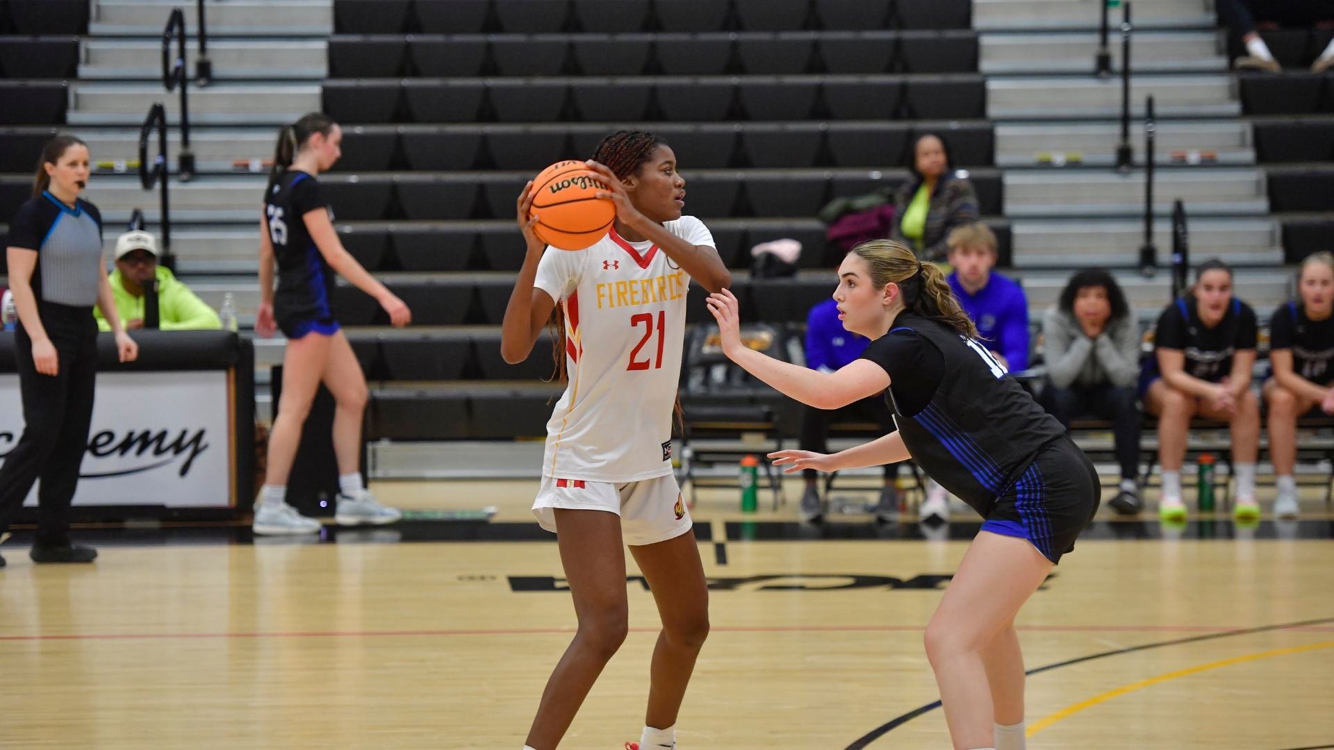 Todd Dominates Boards in Close Overtime Loss