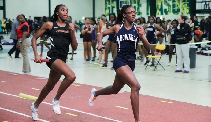 Jerily Benjamin nearly closes on the Howard 4x400M relay team during the anchor leg. The Firebirds were the 2nd best of 17 teams in that event.